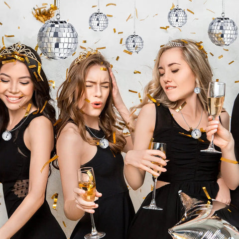 Women celebrating under 20 Piece Mini Mirror Disco Balls Set With Rope Assorted Silver Reflective Party Decor For 70s Weddings Dance Floors And Music Events In Sizes From 1.2 To 2.4 Inches.