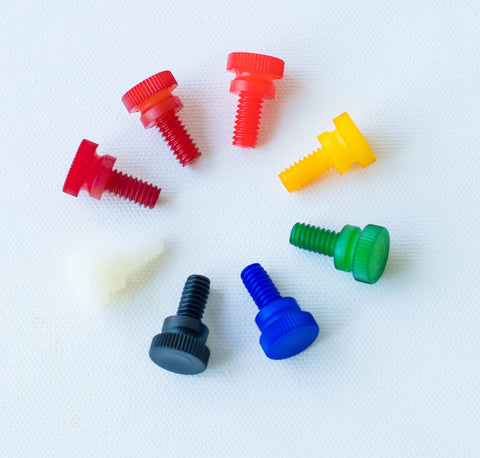 Top Shelf Nylon Thumb Screws Quarter Inch Twenty Thread Half Inch Long Black Quick Turn Fasteners in assorted colors.