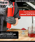 ARES 54036 two-piece deluxe bearing packer kit, front view with red grease gun and cone-style packer.
