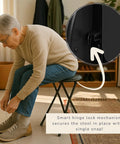 Backless Folding Stool, 24-Inch Tall, 225Lb Capacity, used by a person tying shoes, hinge lock mechanism detail visible, black