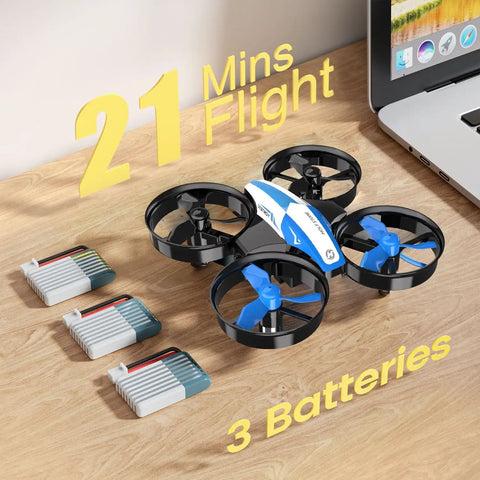 Indoor Nano Drone For Kids And Beginners With Auto Hover And Toss To Launch Circle Fly And 3D Flips Headless Mode Altitude Hold Includes 3 Batteries Dope Gift For Boys And Girls In Blue Edition with three batteries next to a laptop on a wooden table.