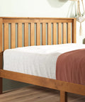 Top Tier Queen Platform Bed Frame With Tufted Fabric Headboard Solid Wood Slats Heavy Steel Base No Box Spring Needed showing wooden headboard and slats.