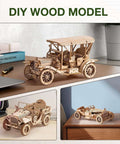 Wowood maple plywood car models on a desk; three wooden vehicle DIY models.
Left-side view of a maple plywood vintage jeep model with exposed gears.
Close-up of a small maple plywood roadster model on a desk beside books.