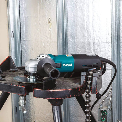 Heavy Duty 6 Inch Cut Off And Angle Grinder With 13 Amp Motor Variable Speed 4000 To 10000 RPM SJS System on a workbench