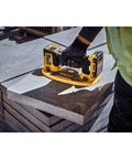DeWalt 20v Max Cordless Grabo Vacuum Suction Lifter With Built In Pressure Sensor For Heavy Materials Up To 265 Lbs Bare Tool Only in use on concrete slabs.
