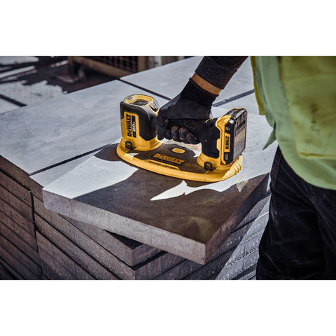 DeWalt 20v Max Cordless Grabo Vacuum Suction Lifter With Built In Pressure Sensor For Heavy Materials Up To 265 Lbs Bare Tool Only in use on concrete slabs.