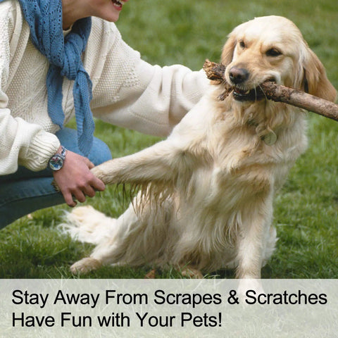 Person wearing Level 5 Cut Resistant Sleeves 2 Pack With Thumb Holes, 18 Inch Extra Long Arm Guards playing with dog