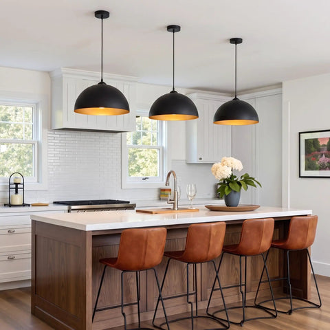 Esfos 11.8" Black and Gold Pendant Lights Kitchen Island, 3 Pack Chandelier over a modern kitchen island with brown stools.