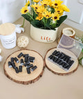 36 Pack Waterproof Wire Nut Connectors For Outdoor Electrical Wiring, black twist-on caps displayed on wooden slices