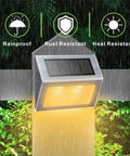 Solar Step Lights For Decks Pathways Stairs And Yard Fences LED Outdoor Waterproof Warm White Glow installed on fence