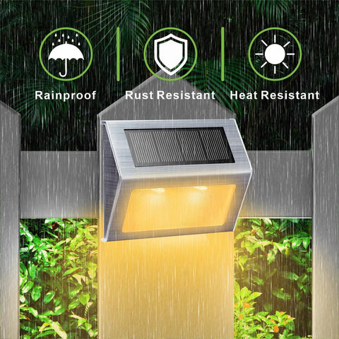 Solar Step Lights For Decks Pathways Stairs And Yard Fences LED Outdoor Waterproof Warm White Glow installed on fence