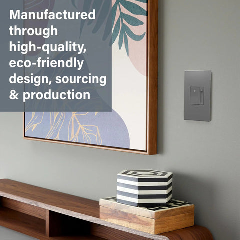 Premium Magnesium Paddle Dimmer installed on a wall near decorative boxes and artwork, suitable for residential wiring.