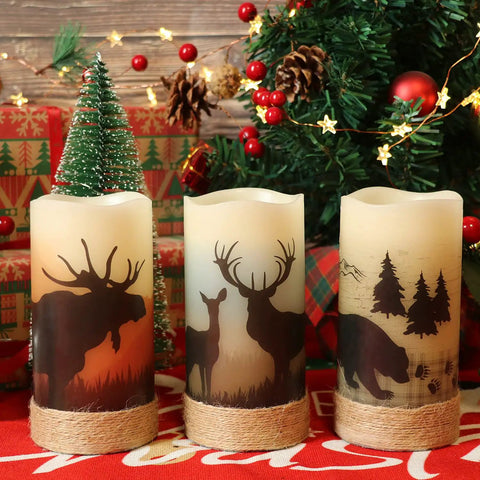 Flameless Flickering LED Pillar Candles With Hemp Rope And 6 Hour Timer Battery Operated Set Of 3 Real Wax Rustic Candles With Deer Moose Bear Decals For Cozy Christmas Home Decor Vibes in front of Christmas tree