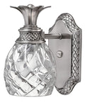 Plantation Style One Light Bathroom Vanity Fixture In Polished Antique Nickel With Silver Patina Finish on textured glass