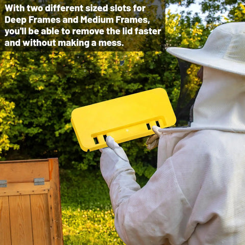 Beekeeper holding yellow part from Beekeeping Uncapping Kit With Tank Holder And Plastic Scraper Tool Serrated Knife Set