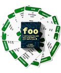 Icebreaker Coding Card Game For Programmers And Devs box surrounded by scattered coding term cards.
