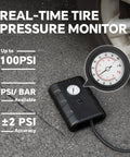 Portable 12V Tire Inflator With Analog Gauge, 100 PSI Quick Air Pump beside car tire on asphalt