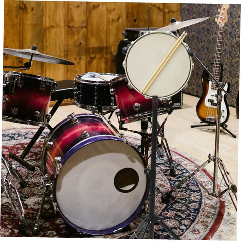 Badass Alloy Drum Holder Stand For Snare Practice Silent Support Rack, purple and black drums, featuring a practice pad.