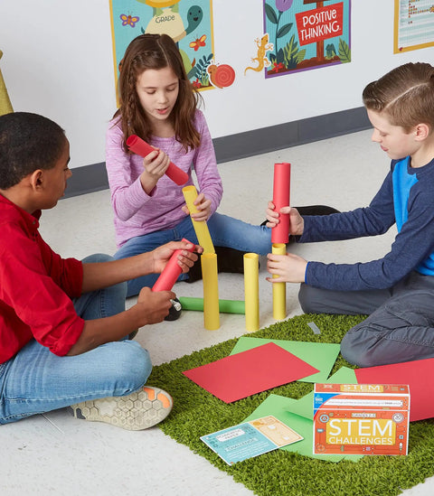 Hands-On STEM Challenges Learning Cards For Grades 2 To 5 Science Kits With Fun Facts And Real-World Projects Across Physical Life Earth And Space Science For Curious Kids. Children stacking tubes during a STEM activity