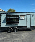 Custom Rollout Food Trailer Kitchen Unit featuring heavy duty refrigerator, commercial sink, and juicer station, designed for street snacks.