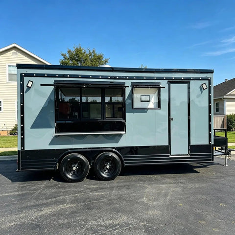 Custom Rollout Food Trailer Kitchen Unit featuring heavy duty refrigerator, commercial sink, and juicer station, designed for street snacks.