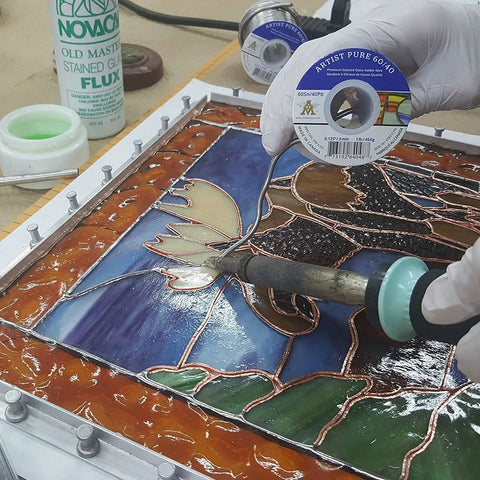 Artist Pure 60/40 Stained Glass Solder Wire 0.125 Inch Thick 1lb Spool used on stained glass panel with soldering iron