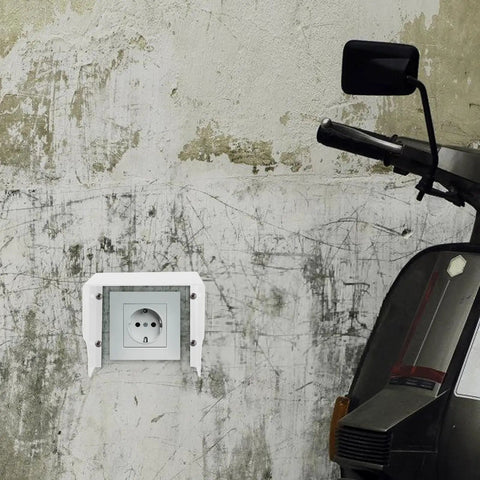 Heavy Duty White Iron EV Charging Station Rain Cover Wall Mount Waterproof Outlet Box for electric bike near textured wall.