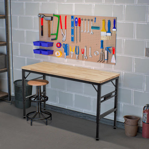 Heavy Duty Adjustable Height Workbench With Built In Power Outlets And Solid Rubber Wood Top Rock Solid Two Thousand Pound Capacity Garage Beast for Shop Projects And Buildouts with tools on pegboard.