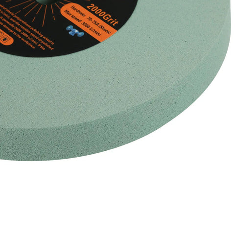 Hella Durable 8 Inch Polyurethane Buffing Wheels 2000 Grit Silicon Carbide Abrasive close-up showing smooth surface and label.
