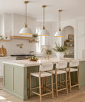 Caiselee 13 in Dome Pendant Light, 1-Light White and Gold Pendant Lighting hanging over a modern kitchen island with green cabinetry.