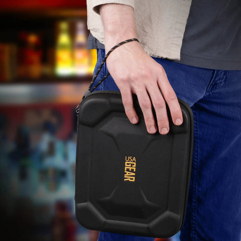 Person holding XL Dart Case With Locking Foam For On The Go Transport, semi hard shell, black color