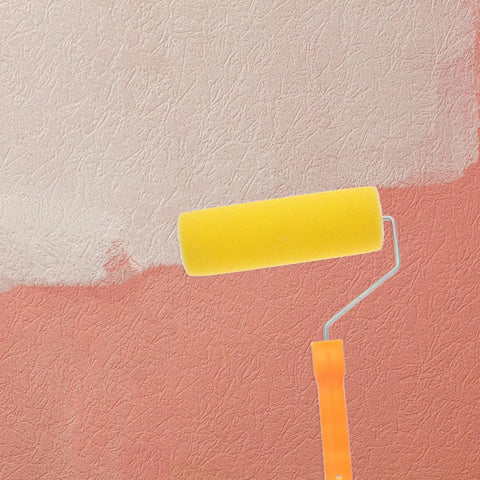 Textured Sponge Paint Roller For Wall Painting With Ergonomic Handle Game Changing Kit For Fast Laydown And No Sweat Cleanup Effortless Rinse Heavy Duty Gear applying paint on a textured wall.