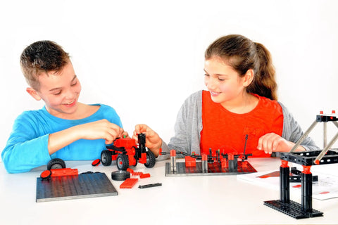 Boy and girl building models with Mechanic And Static 2 Building Kit With 500 Pieces For 30 Models Delivers Hands On Gear Systems And Stable Structures Requires 9V Battery Not Included Or Accu Set 57487 Ideal STEM Toy For Young Engineers And Builders.