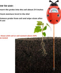 Green Soil Moisture Meter For Indoor And Outdoor Plants No Batteries Needed Easy To Read Plant Water Gauge next to soil and plant.