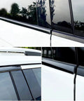 16ft gloss black universal automotive trim strip, 1in wide, installed along window and roofline on white SUV.