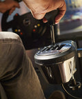 Next Level All Metal H Pattern And Sequential Sim Racing Shifter With Real Hall Effect Sensors For Plug And Play Setup and Ridiculously Smooth Shifts On Ps5 Xbox Pc in action with hand gripping gear lever.