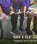 Children sitting on insulated rolling cooler with wheels that keeps ice for days, leak-resistant hard ice chest, 100-quart capacity lid.