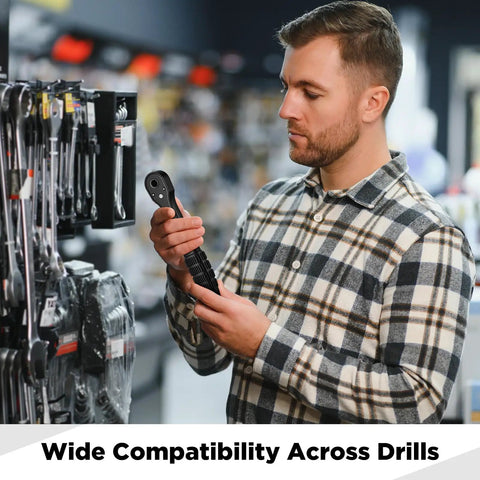 Man inspecting Smooth Operator 2 In 1 Drill Chuck Ratchet Spanner Universal Chuck Key Replacement Wrench in tool aisle.