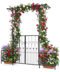 Garden Arbor With Gate And Planter, Metal Arch Trellis With Double Doors, 79 Inches Wide By 81 Inches High adorned with flowers