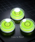 4Pcs Small Circular Bubble Levels, Double Sided Adhesive Bottom Mini with vibrant green liquid, easy readability on dark background.