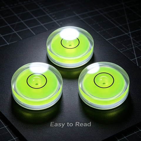 4Pcs Small Circular Bubble Levels, Double Sided Adhesive Bottom Mini with vibrant green liquid, easy readability on dark background.