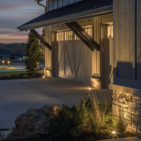 Lit Low Voltage Well Lights 4W LED Outdoor Landscape Lighting 12V In Ground Well Light 200 Lumen Warm White 2800K illuminating driveway
