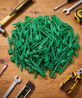 200 Pack 4 Inch Biodegradable Landscape Stakes For Landscape Fabric Weed Barrier And Turf Sod Staples piled on table