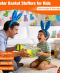 Father and son exchanging gift with Easter basket stuffers for kids featuring race track set, balloons, and decorations.