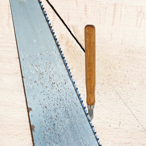 Badass Marking Knife Set High Carbon Steel Blades With Double Bevel Edges And Ergonomic Grip Handle on wood backdrop next to a saw.