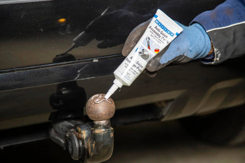Applying Anti-Seize Assembly Paste, 3.0 Oz, Heat Resistant Lubricant And Corrosion Protection For Fasteners And Threads to hitch ball.