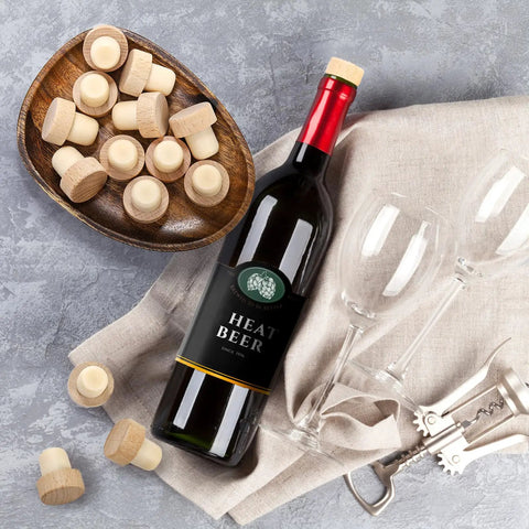 60 Pieces T Shaped Wine Corks Reusable Cork Plugs Wooden And Rubber Wine Stoppers for Wine Beer DIY Crafts next to bottle