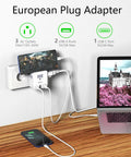 Six In One European Travel Plug Adapter With 20W PD USB C And USB A QC 3.0 Ports charging multiple devices on a desk