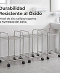 Metal Storage Rack On Wheels, floor-standing movable shelving unit in bathroom for easy organization, rust-resistant and durable.