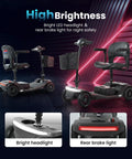 Mobility scooter M2: two black units with LED headlight, rear brake light, and adjustable tiller.
